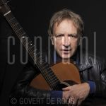 22-06-2006 Alex Roeka at studio in Amsterdam.

[keywords]Posed, Half Length, Eyecontact, Guitar, Singer[/keywords]